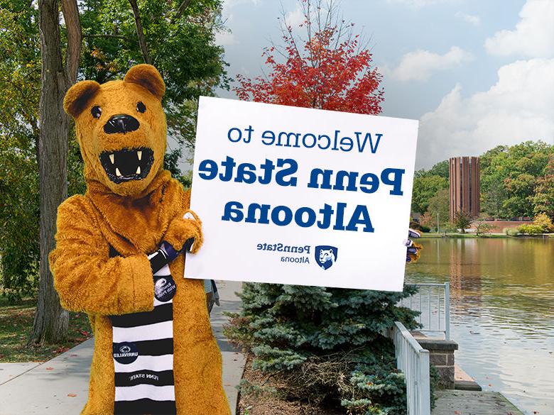 The Nittany Lion mascot holding up a sign reading Welcome to <a href='http://j8k1.daves-studio.com'>十大网投平台信誉排行榜</a>阿尔图纳分校